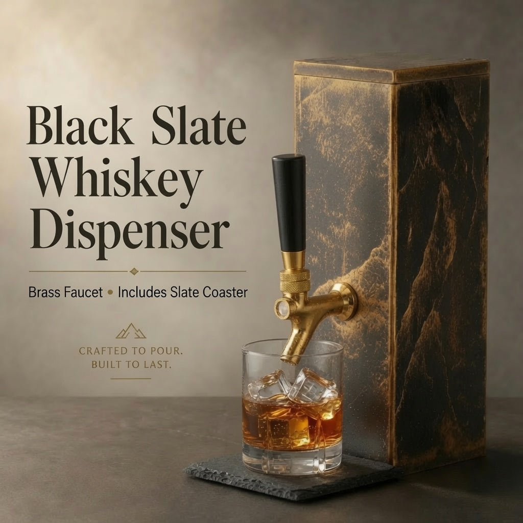Black slate whiskey dispenser with brass faucet, subtle gold-toned finish, and matching square slate coaster.