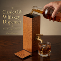 Classic oak whiskey dispenser with smooth lacquered exterior, charred interior, and brass faucet
