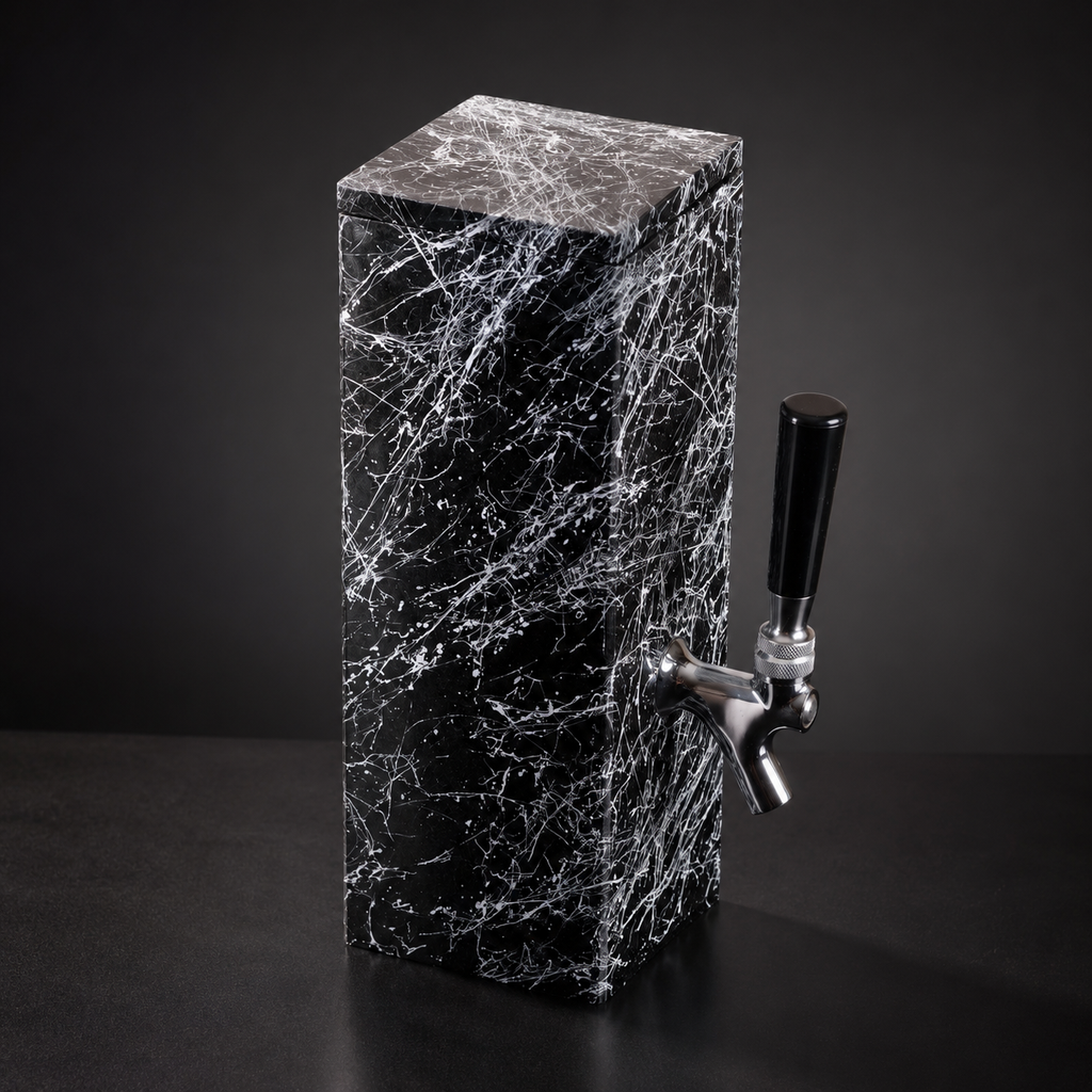 Black granite beverage dispenser with white splatter finish and polished metal tap