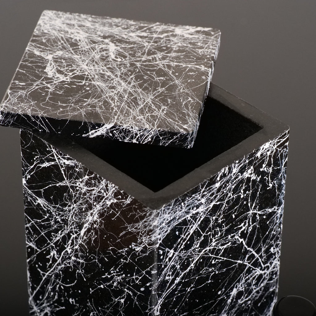 Black granite beverage dispenser with removable stone top cover opened for filling