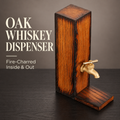 Charred oak whiskey dispenser with brass tap, wooden platform, and lid. Text reads “Oak Whiskey Dispenser — Fire-Charred Inside & Out.”