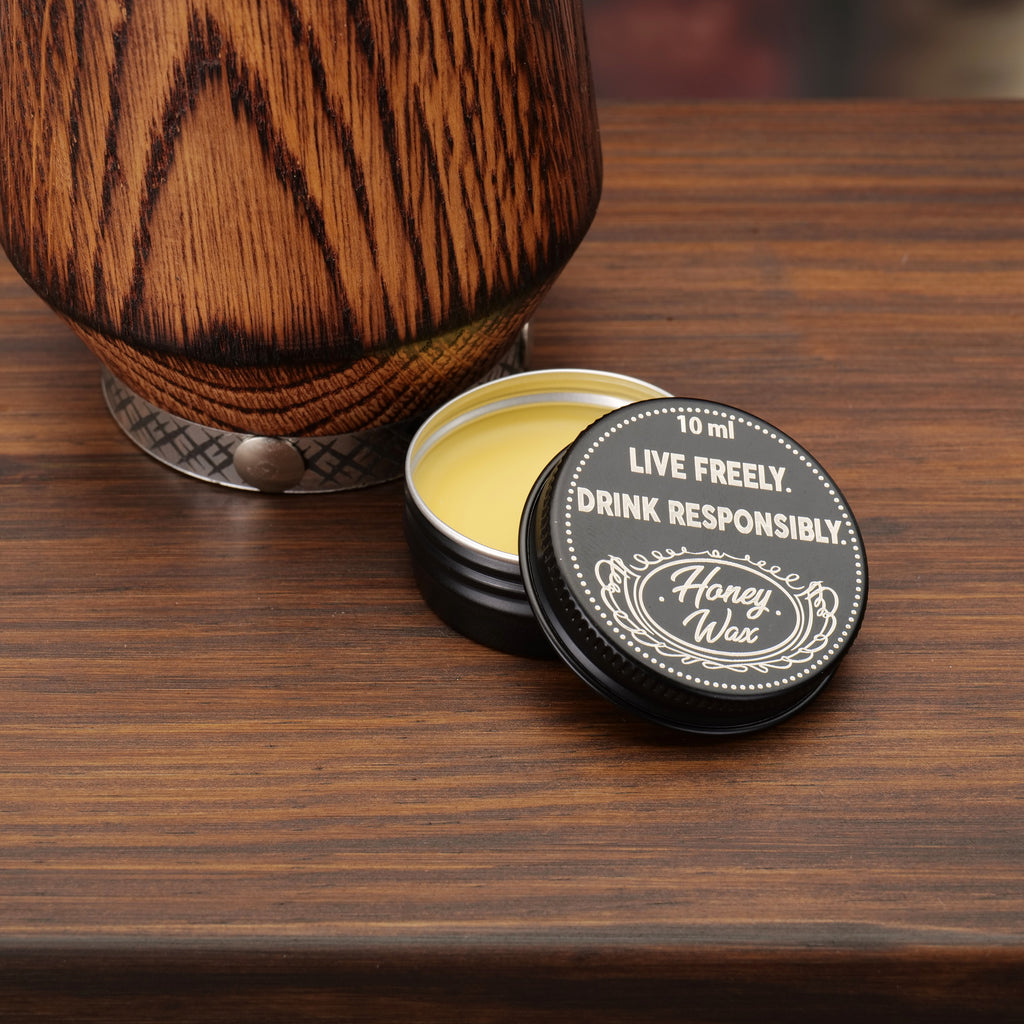 Charred oak whiskey tumbler with natural beeswax care balm