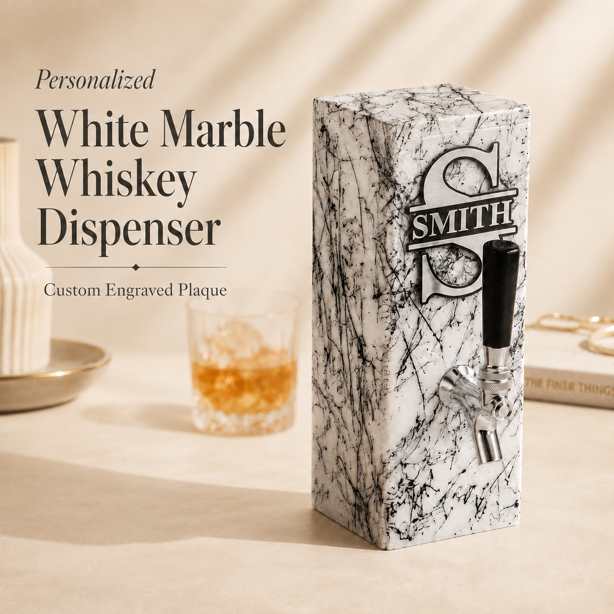 Personalized white marble whiskey dispenser with engraved aluminum plaque and silver-tone tap, styled with a whiskey glass for a custom bar gift.