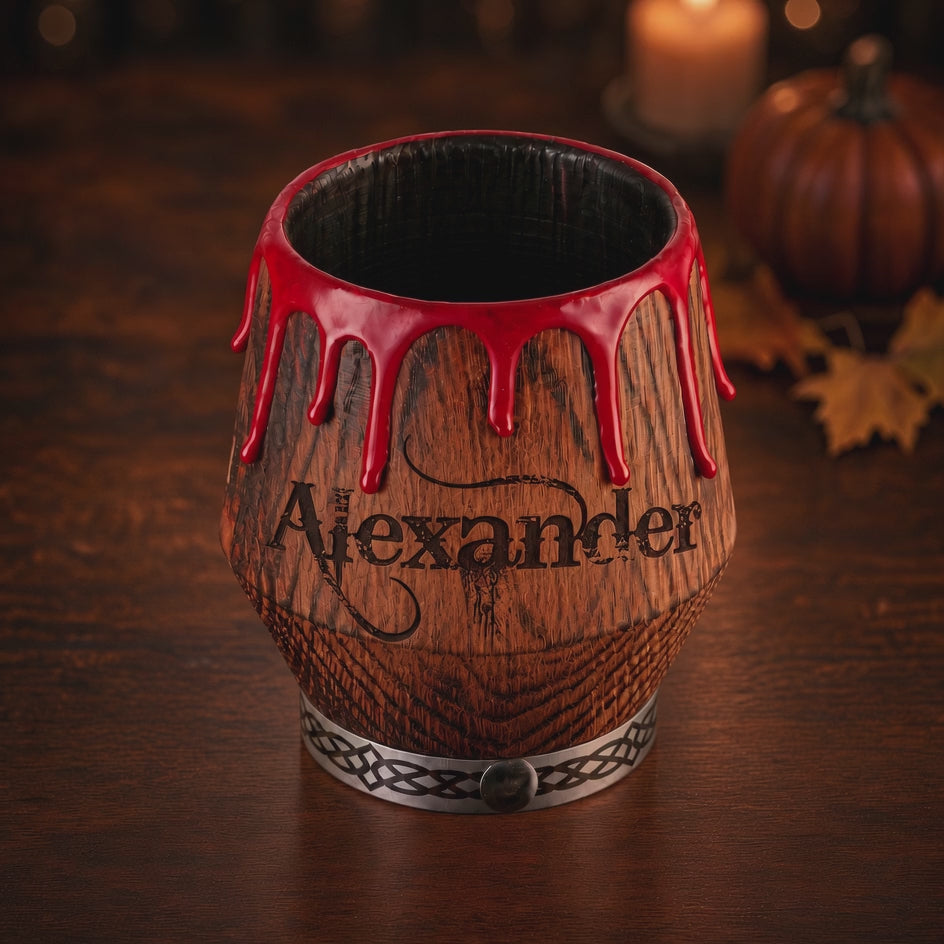 Video of personalized oak whiskey glass showing custom engraving, red drip finish and metal base