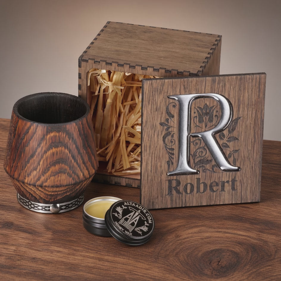 Product video featuring a charred oak whiskey tumbler, personalized wooden gift box with silver R inlay, and care balm