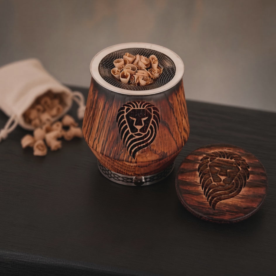 Process video showing oak chips being ignited in a whiskey smoker kit with engraved oak glass.