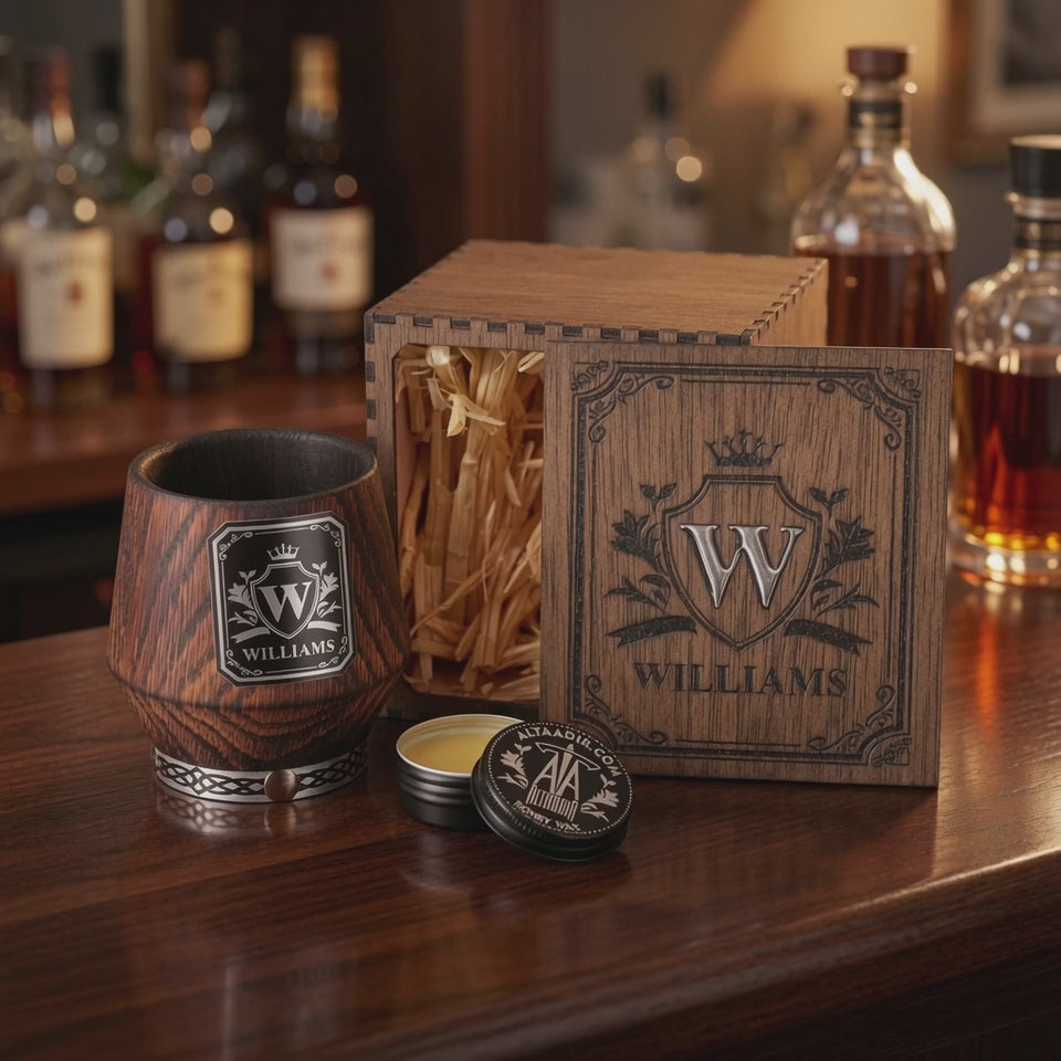 Video showing a personalized charred oak whiskey glass, engraved wooden gift box, silver epoxy inlay lid, and included care balm.