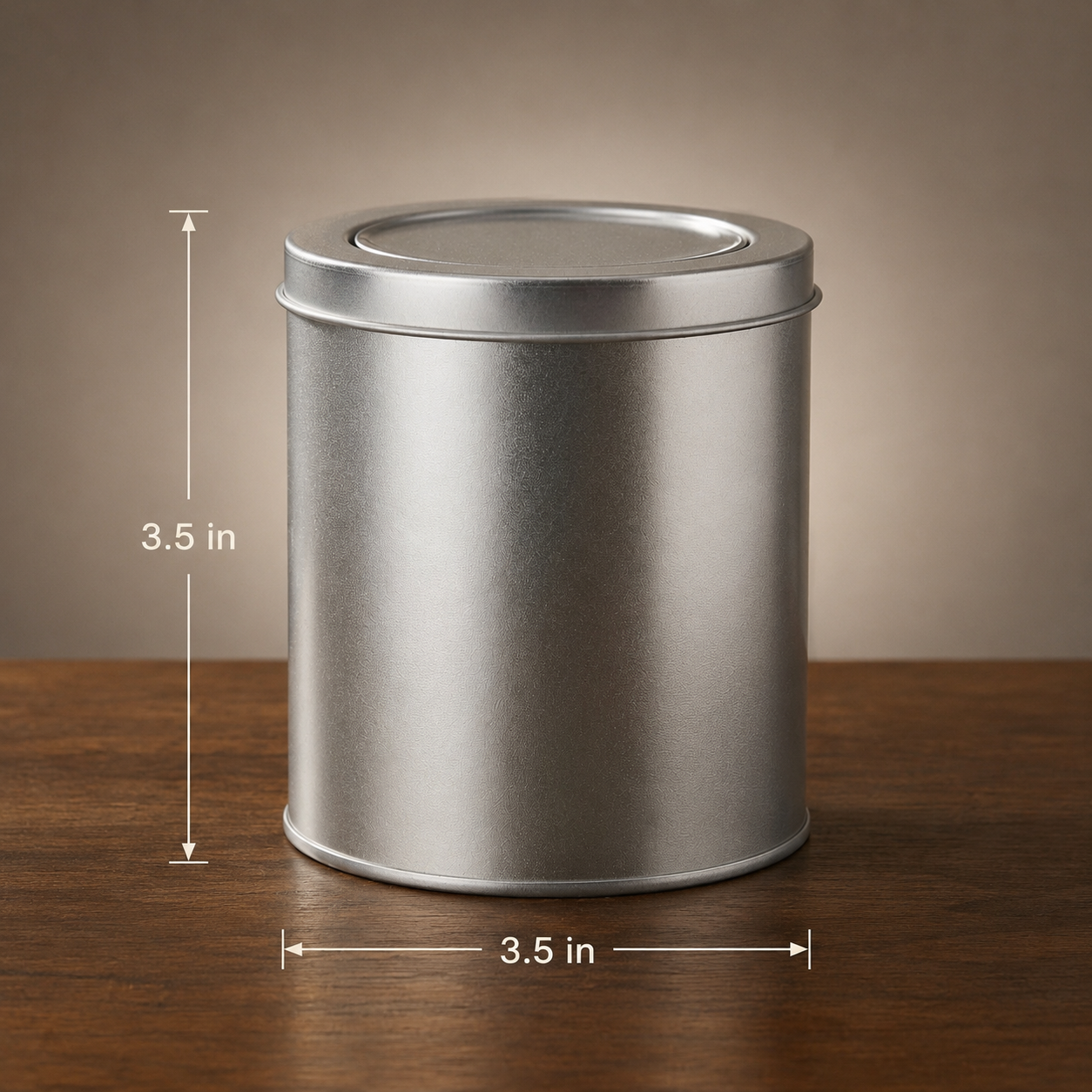 Round silver metal gift box size infographic showing approximately 3.5 inch dimensions