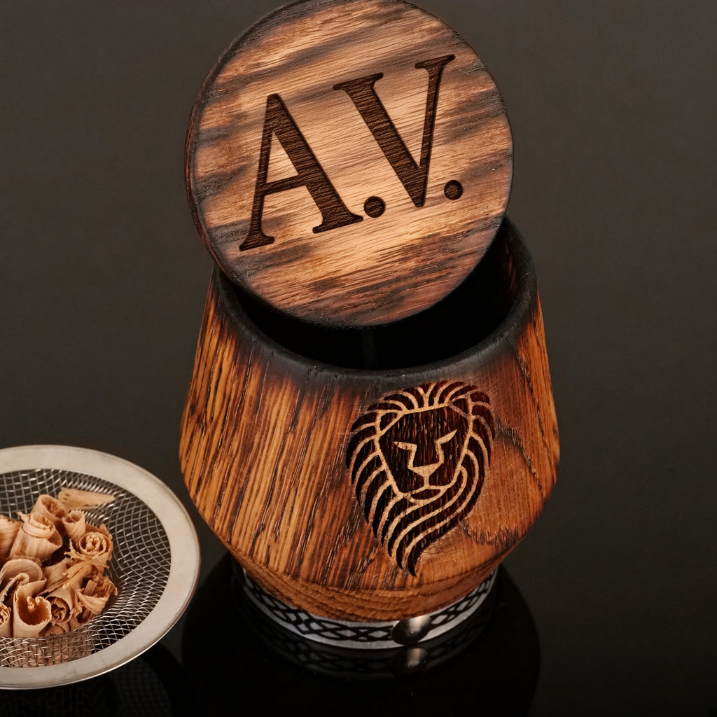 Personalized oak whiskey smoker kit with engraved monogram lid and charred oak glass.