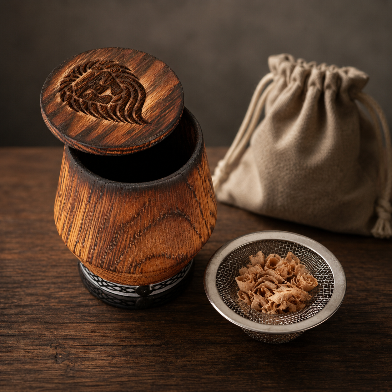 Oak whiskey smoker kit with engraved glass, wooden lid, metal smoking insert, and pouch of oak chips.