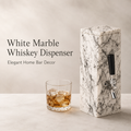 White marble whiskey dispenser with hand-decorated black pattern, silver-tone tap, and glass of whiskey for elegant home bar decor.
